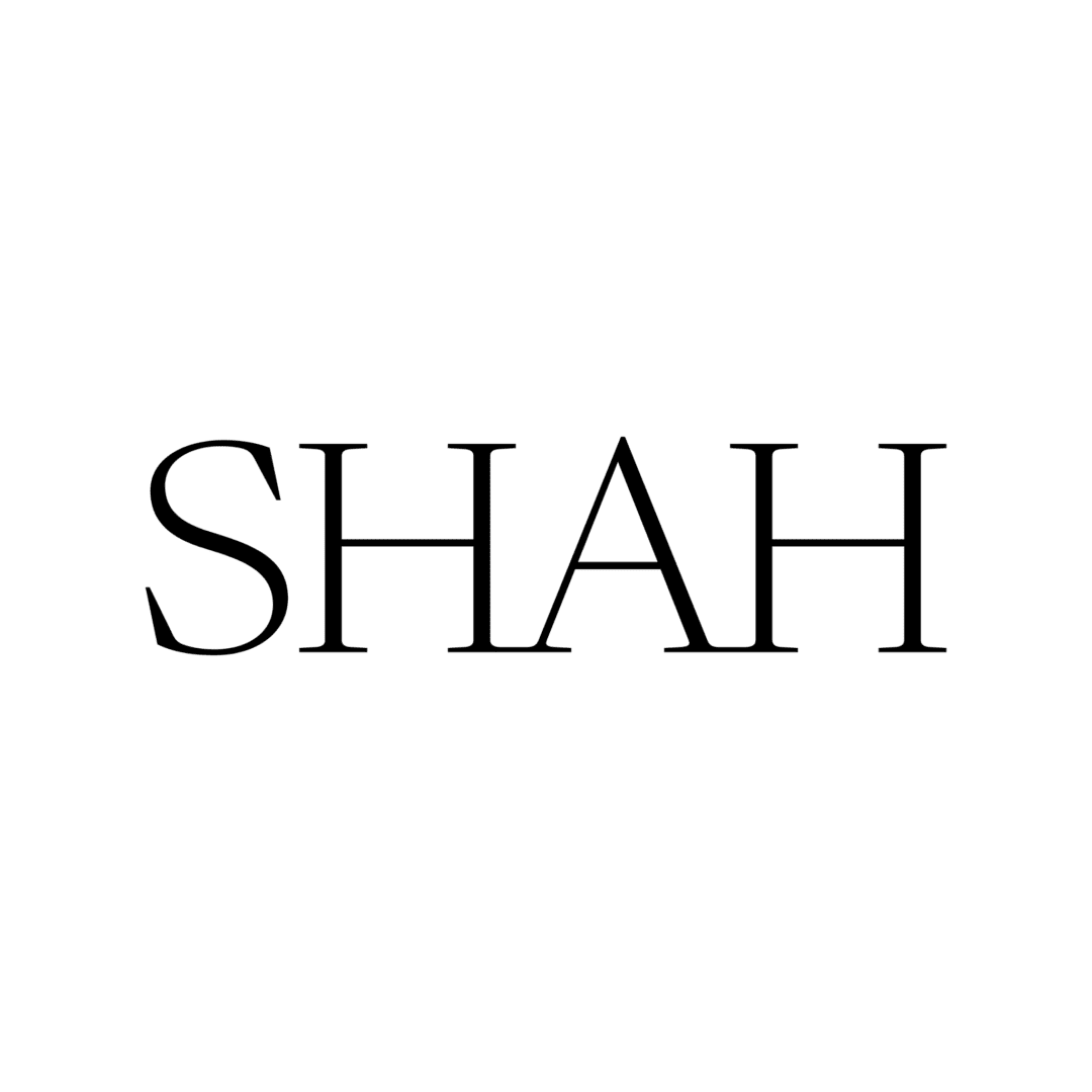 A black and white image of the word shah.