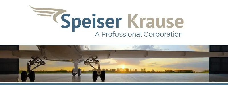 A picture of an airplane with the words " peiser kraut, a professional corporation ".