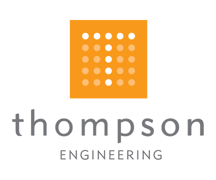 A logo of thompson engineering