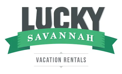 A logo for lucky savannah vacation rentals.