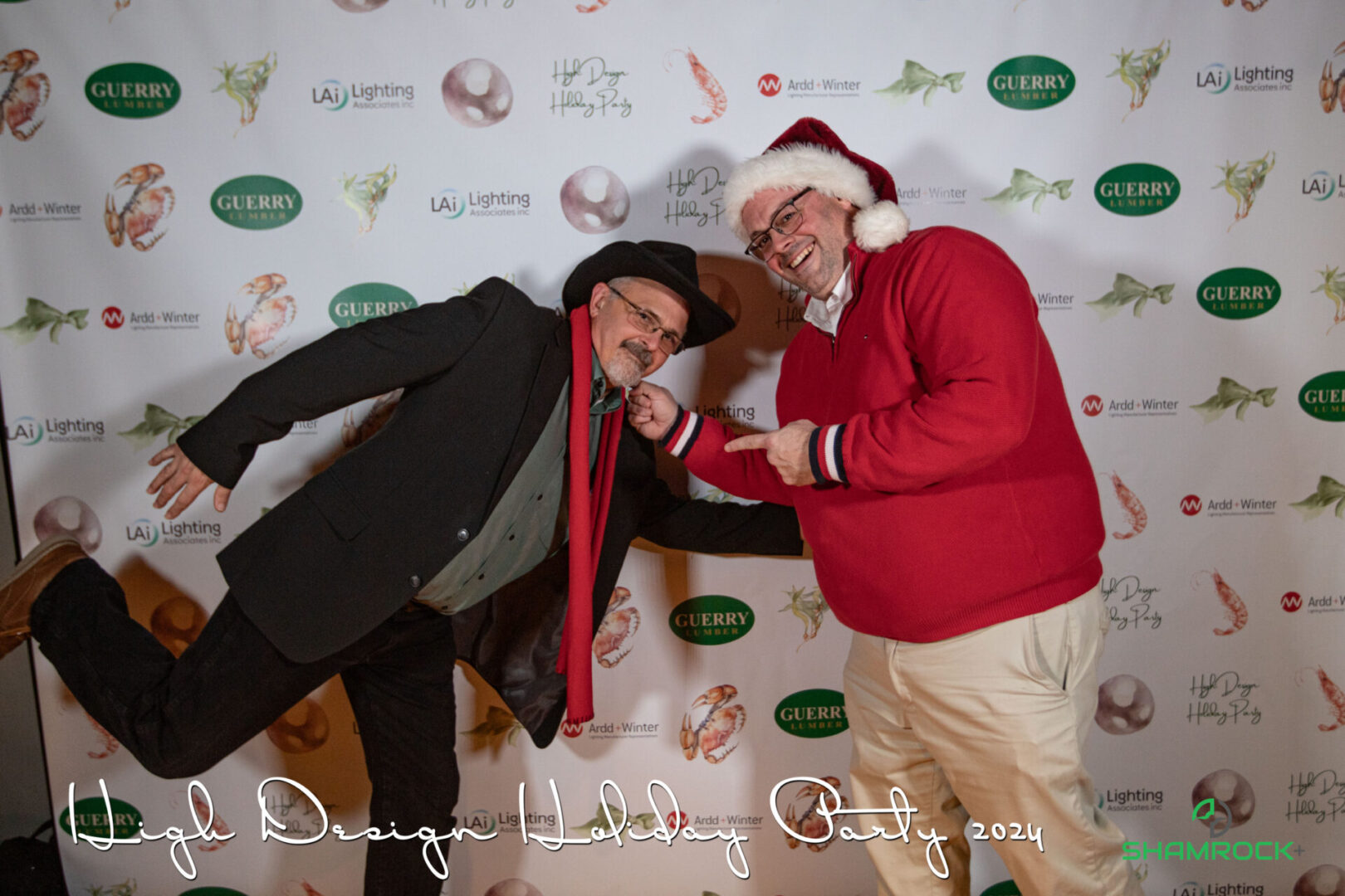 rofessional event photographer capturing a corporate event with branded signage and guest engagement moments.