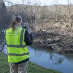 Corporate team working on location at an active project site, captured during real-time operations for brand and marketing use. brand identity
